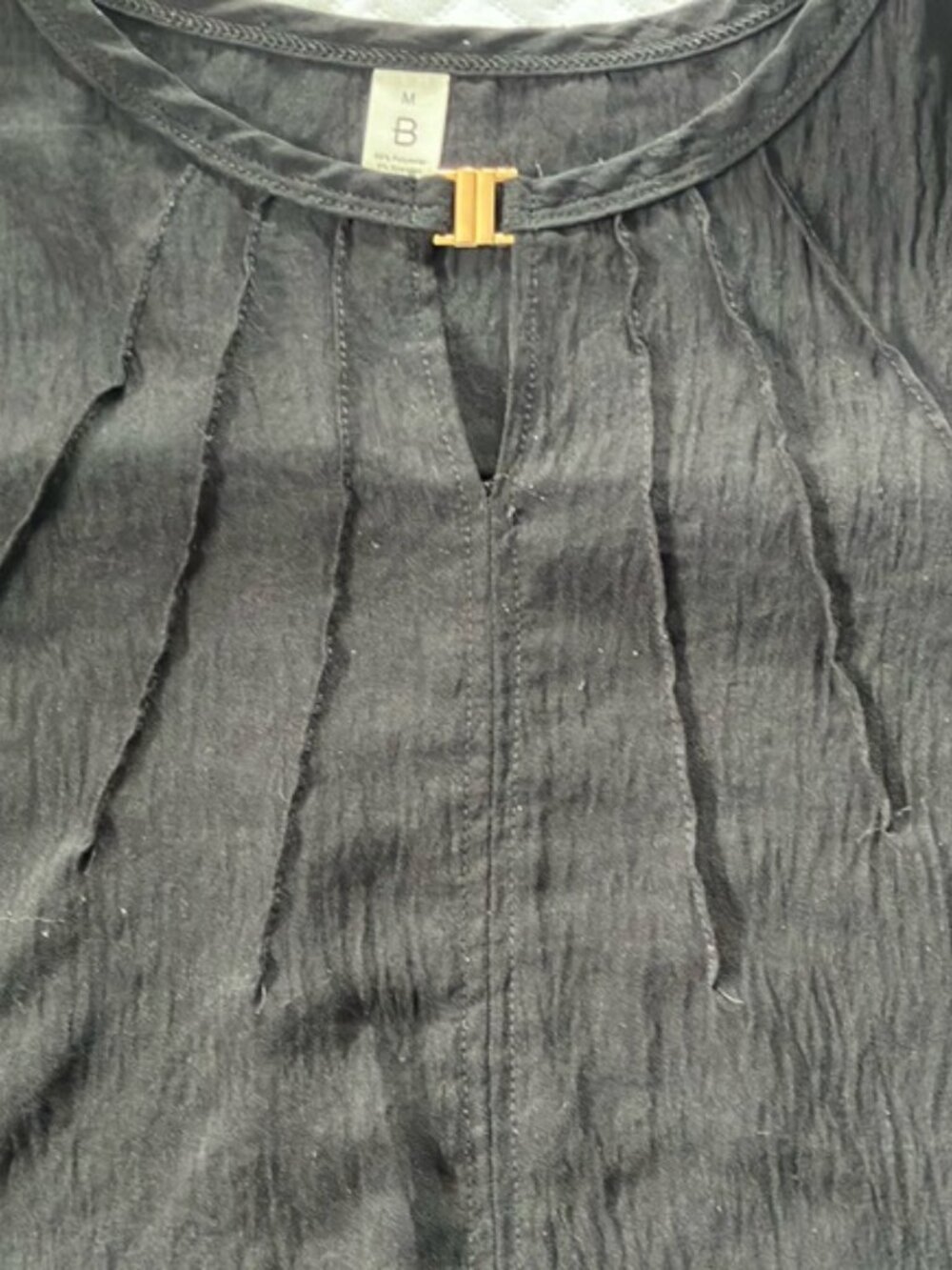 Black Pleated Blouse with Cut Out Neckline